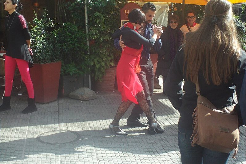 A couple dancing tango in the street in Montevideo