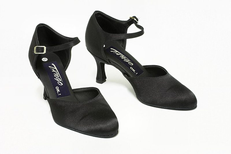 A pair of black satin tango shoes with smooth soles